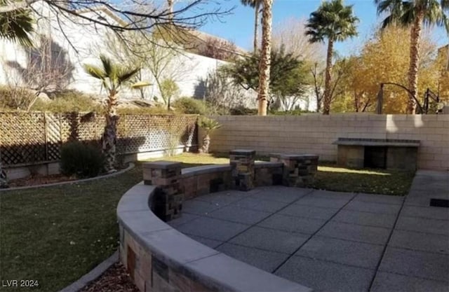 1700 Ravanusa Dr, Henderson, NV 89052 - view of patio with a fenced backyard