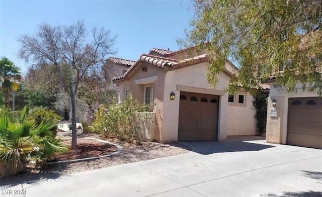 view of property exterior featuring a garage