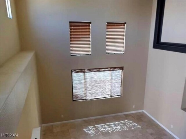 1700 Ravanusa Dr, Henderson, NV 89052 - empty room with baseboards