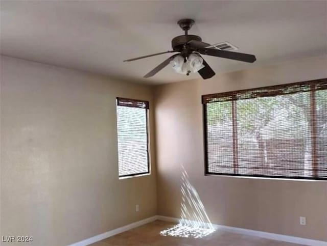1700 Ravanusa Dr, Henderson, NV 89052 - spare room with baseboards and a ceiling fan