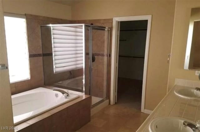 1700 Ravanusa Dr, Henderson, NV 89052 - bathroom featuring a shower stall, a sink, and a bath