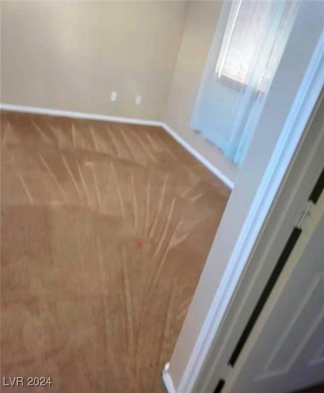 1700 Ravanusa Dr, Henderson, NV 89052 - carpeted spare room featuring baseboards