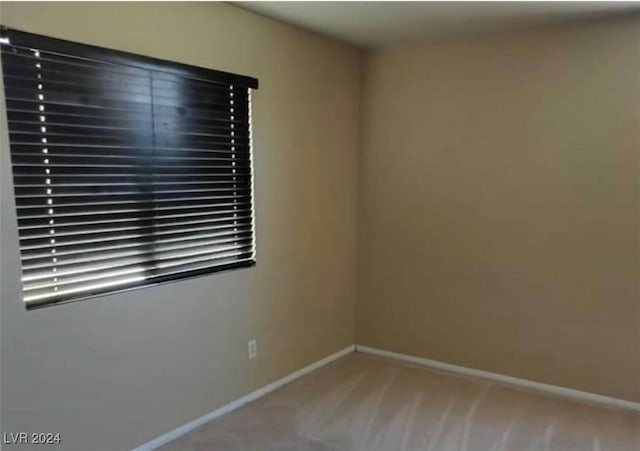 1700 Ravanusa Dr, Henderson, NV 89052 - unfurnished room with baseboards and carpet