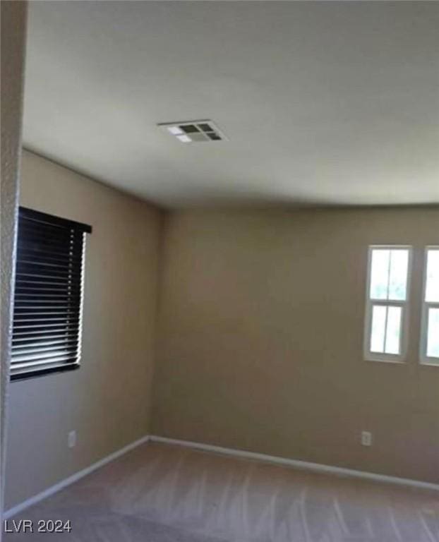1700 Ravanusa Dr, Henderson, NV 89052 - empty room featuring carpet flooring, baseboards, and visible vents