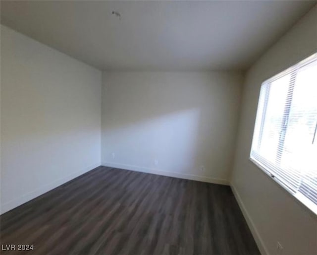 empty room featuring hardwood / wood-style floors