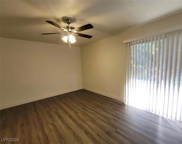 unfurnished room with ceiling fan and wood-type flooring