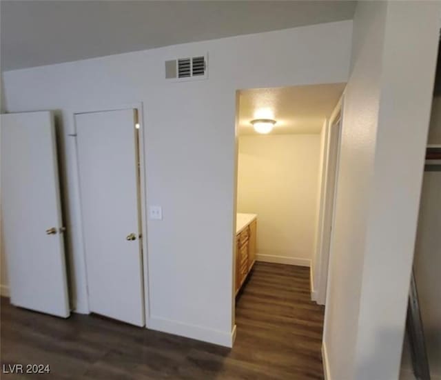 interior space featuring dark wood-type flooring