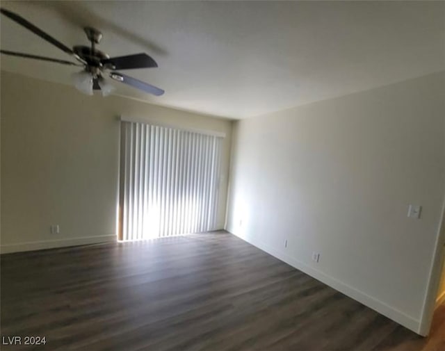 spare room featuring ceiling fan and hardwood / wood-style flooring