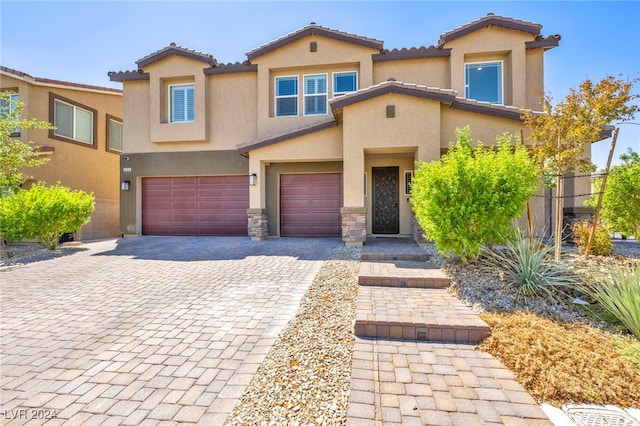 view of front of property featuring a garage