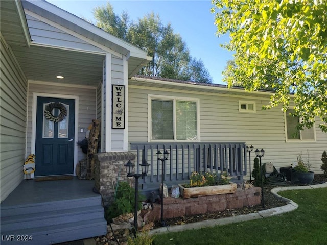 property entrance with a porch