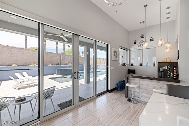 interior space featuring ceiling fan and light tile patterned flooring