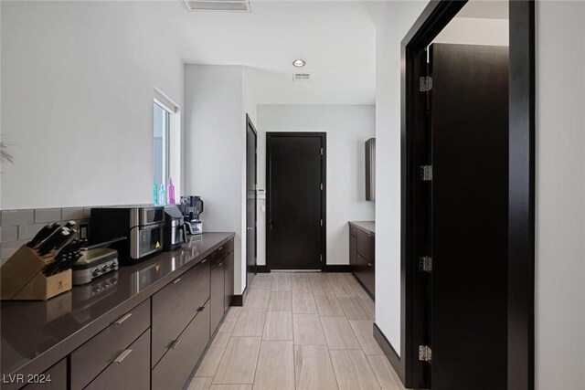 kitchen with light tile patterned floors