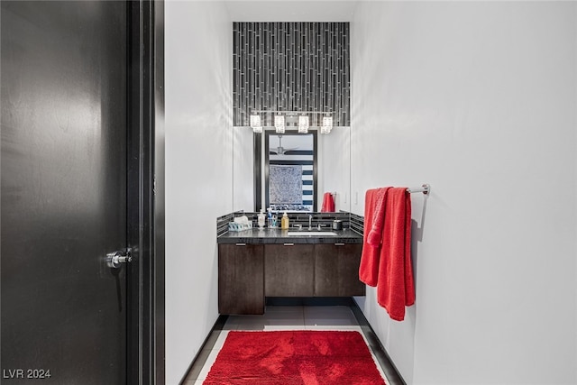 bathroom featuring tile patterned floors and vanity