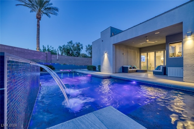 view of pool featuring a patio and pool water feature