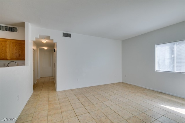 view of tiled spare room