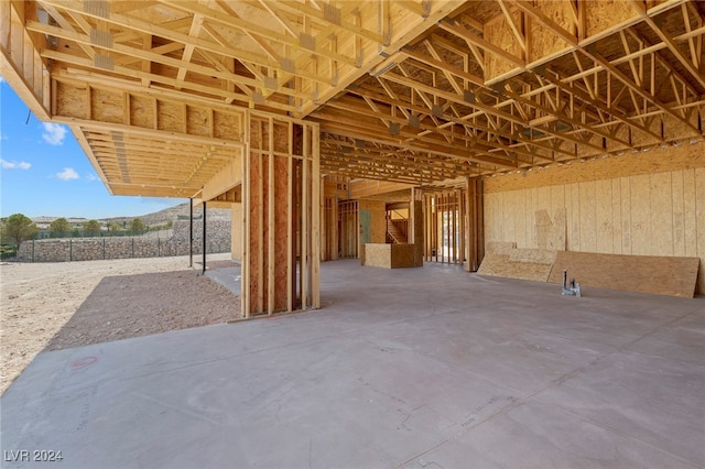 misc room with concrete flooring