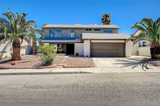 view of front of property featuring a garage