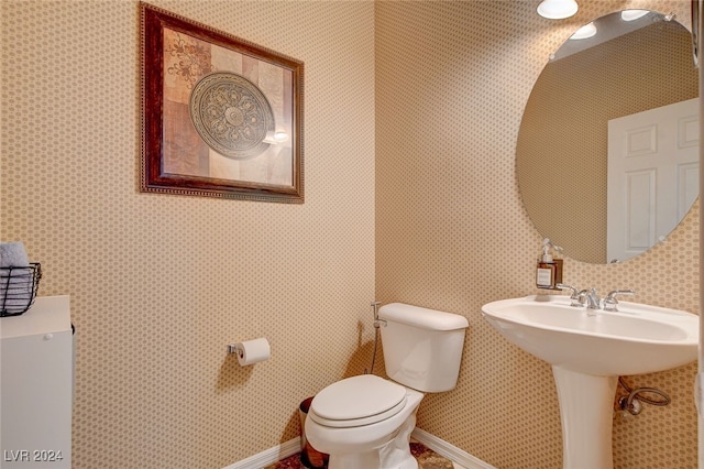 bathroom featuring toilet