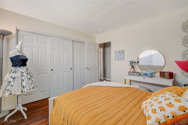 bedroom featuring a closet and wood-type flooring