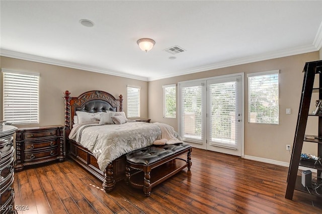 bedroom featuring dark hardwood / wood-style flooring, access to outside, and ornamental molding