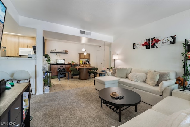 living room featuring light tile patterned floors