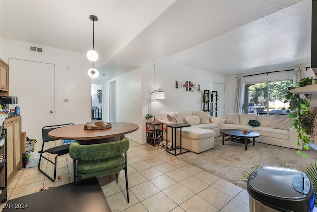 dining room with light tile patterned flooring