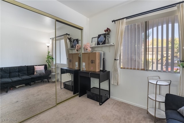 office area with light colored carpet