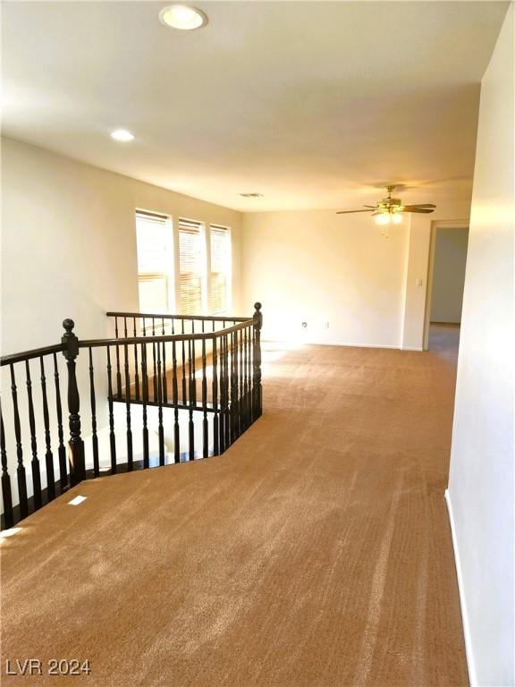 carpeted spare room with ceiling fan and recessed lighting