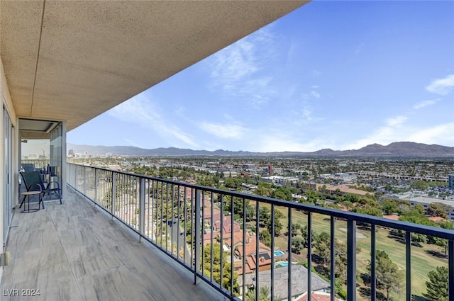 balcony featuring a mountain view