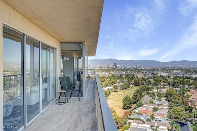 balcony featuring a mountain view