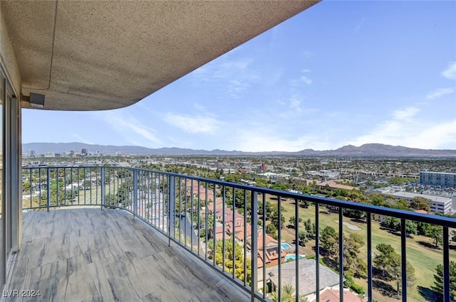 balcony featuring a mountain view