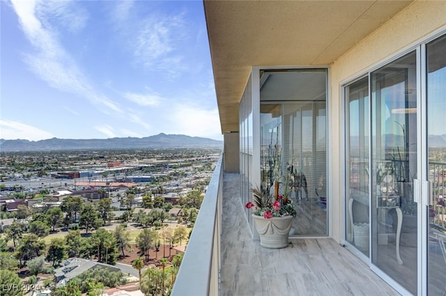 balcony featuring a mountain view