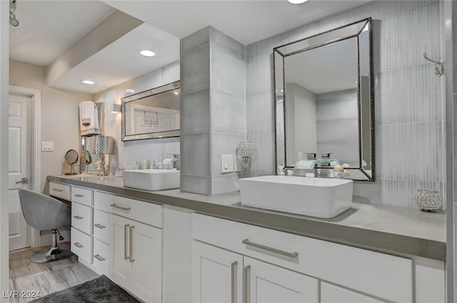 bathroom featuring vanity and hardwood / wood-style flooring