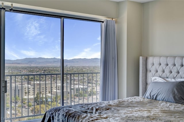 bedroom with a mountain view