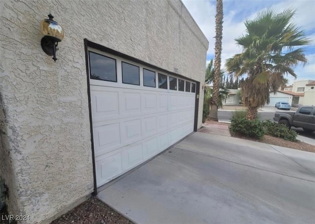 exterior space featuring a garage