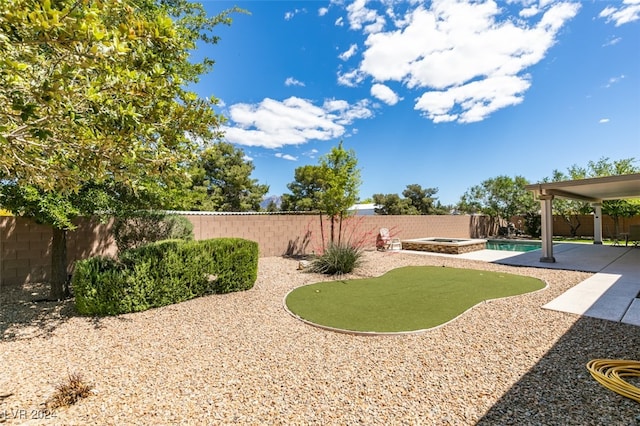 view of yard with a patio area