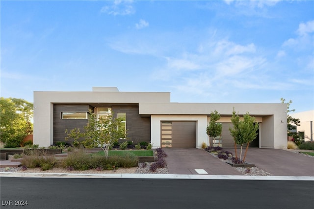 modern home featuring a garage