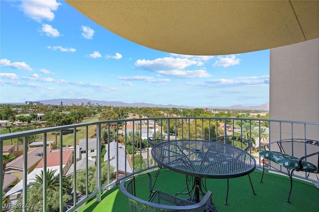 balcony featuring a mountain view