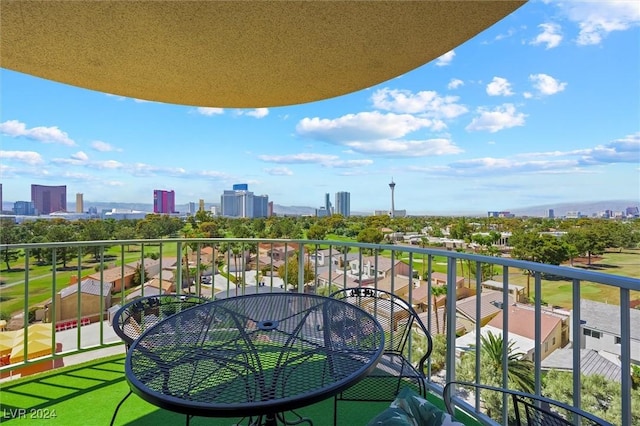 3111 Bel Air Dr Unit 8A, Las Vegas, NV 89109 - balcony with a skyline view