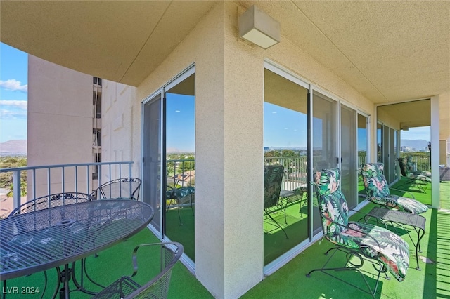 balcony featuring a mountain view