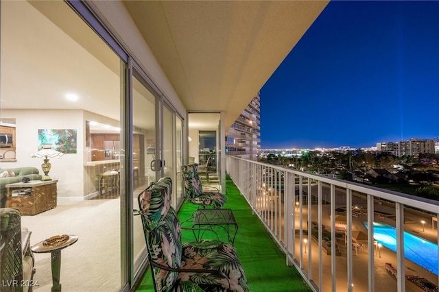 view of balcony at twilight