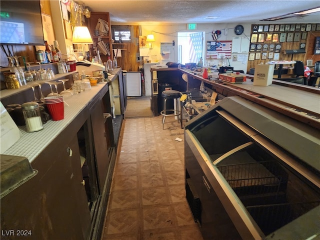 kitchen featuring a textured ceiling