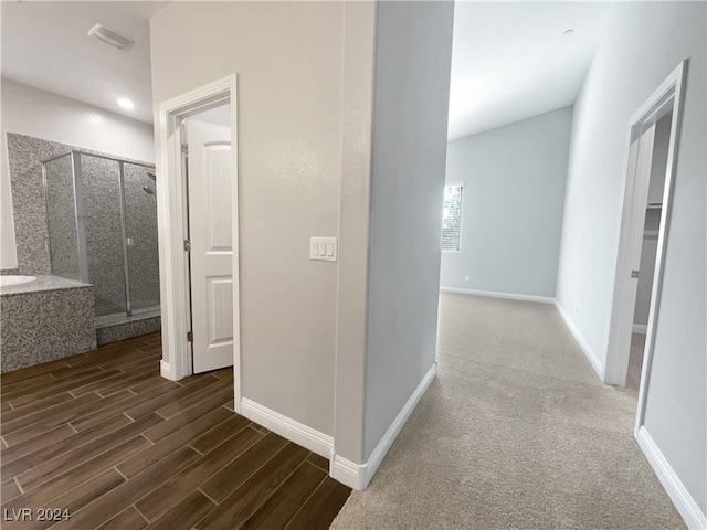 corridor with carpet floors