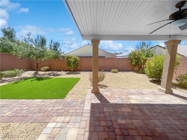 view of patio / terrace featuring ceiling fan