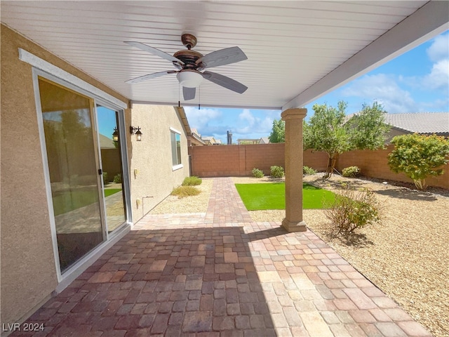 view of patio / terrace featuring ceiling fan