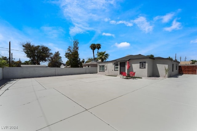 rear view of house with a patio area