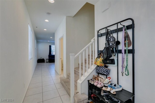 hallway with light tile patterned floors