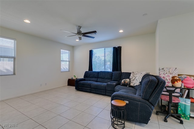 living area with light tile patterned floors, ceiling fan, baseboards, and recessed lighting