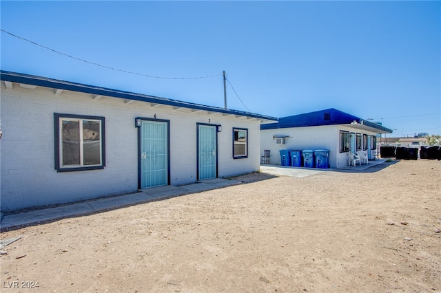 back of house with a patio area