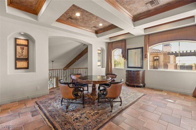 dining area featuring beamed ceiling, coffered ceiling, ornamental molding, and tile patterned flooring